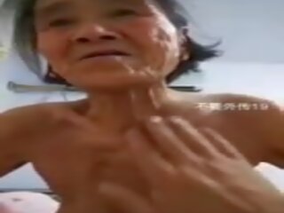 Ķīnieši vecmāmiņa: ķīnieši mobile pieaugušais saspraude izstāde 7.b